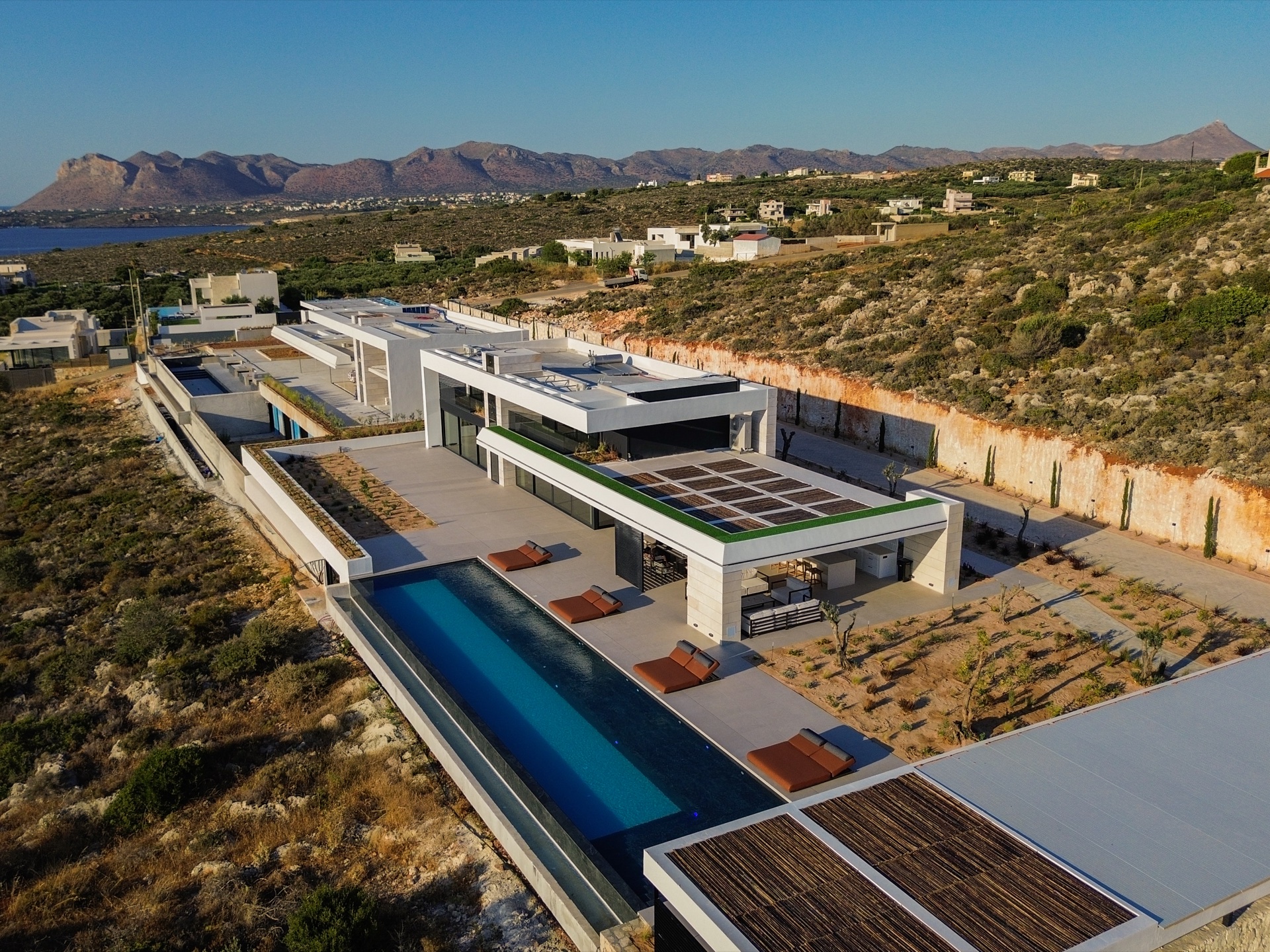 Villa KORA set above the Akrotiri coast