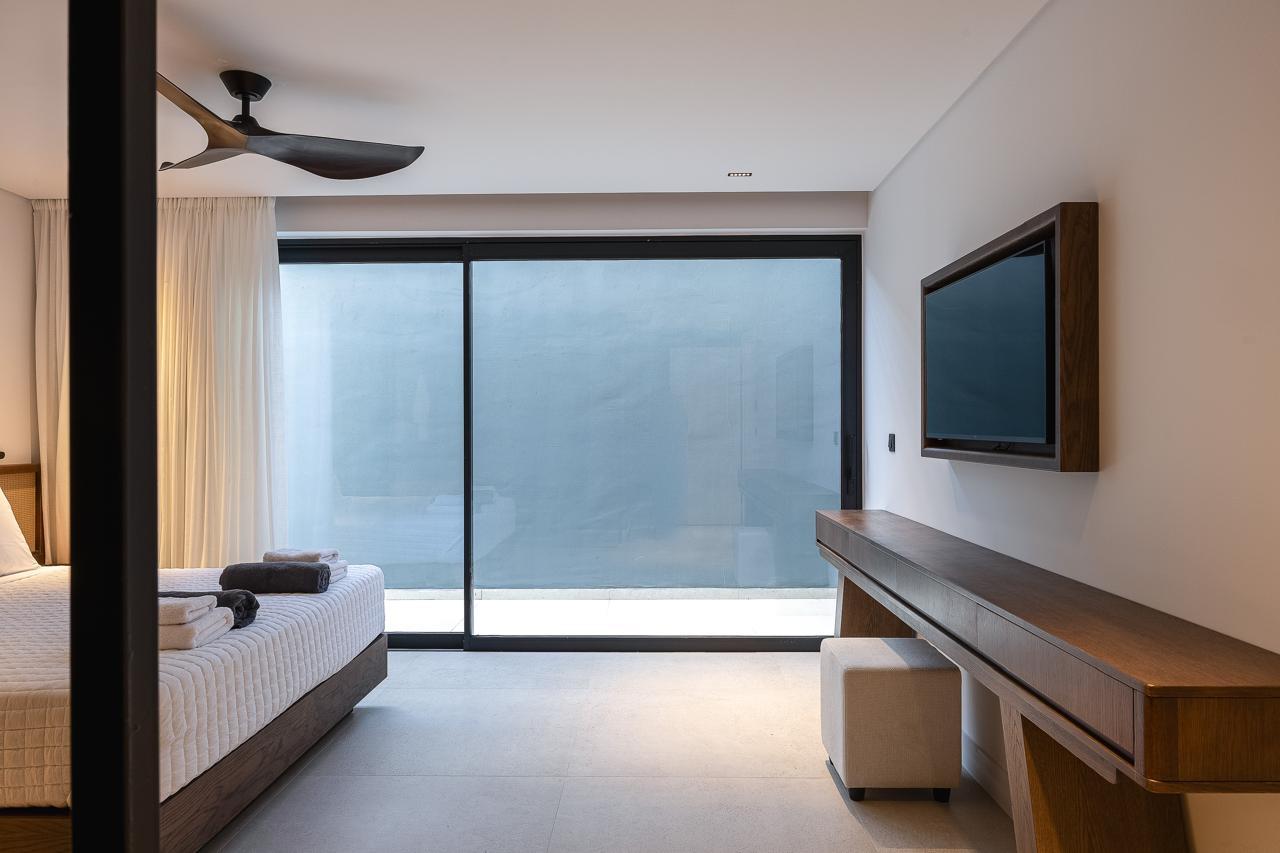 The courtyard suite with full-height glass onto its private patio
